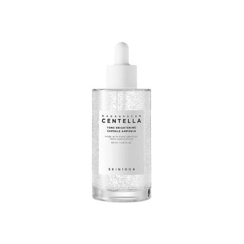 Skincare serum bottle with dropper labeled 'Korean Centella' on a white background